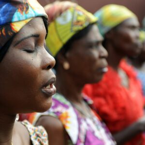 Congolese women sing for Belgium's King Albert II and Queen Paola visiting the King Baudouin hospital in Kinshasa July 1, 2010. Belgian King Albert II is ending a three-day official visit to Congo where he attended the celebrations of the 50th anniversary of its independence. REUTERS/Frederic Sierakowski/Pool (DEMOCRATIC REPUBLIC OF CONGO - Tags: POLITICS) - RTR2FZQK